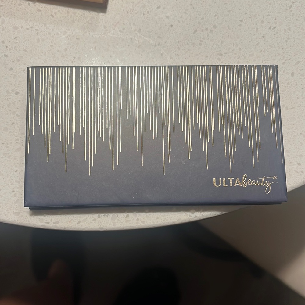 Ulta beauty eye shadow. Dark brown colors. Used
